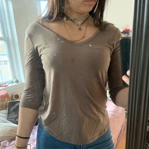 brown v-neck shirt